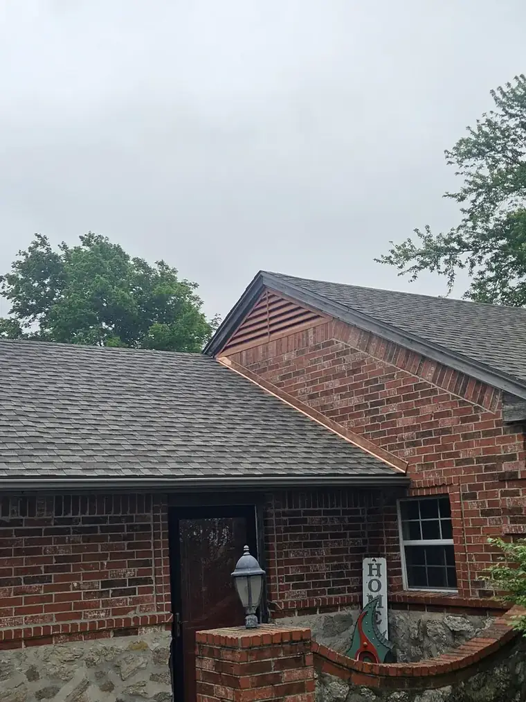 The same roof from the front — new ridge, new gutter, new drip edge — Bartlesville Roofing & Gutters, Bartlesville OK