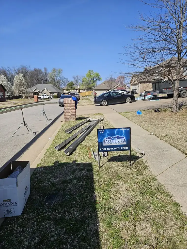 Our yard sign on a Bartlesville job — CIB #80007465, roof now pay later — Bartlesville Roofing & Gutters, Bartlesville OK